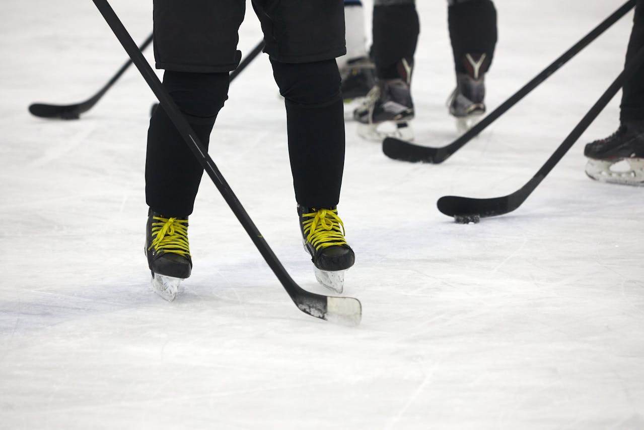 hockey skates with yellow laces